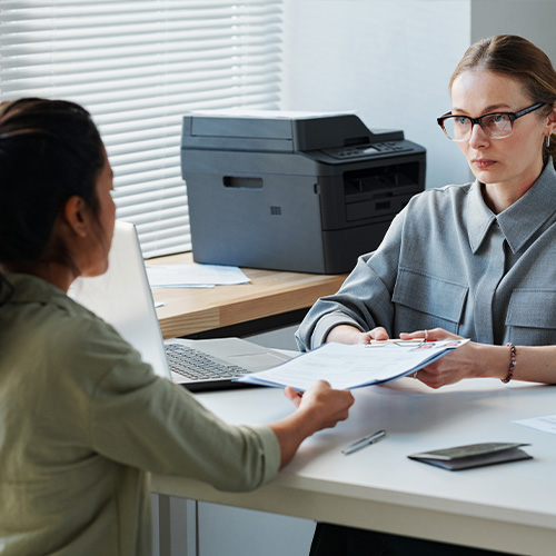 Giving Documents To Embassy Worker