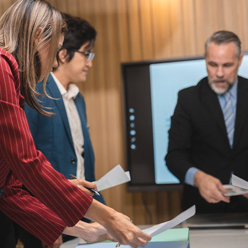 group of businesspeople sitting together in a meeting for best ideas, International executive team people having board discussing project results. Diverse employees group working with senior worker