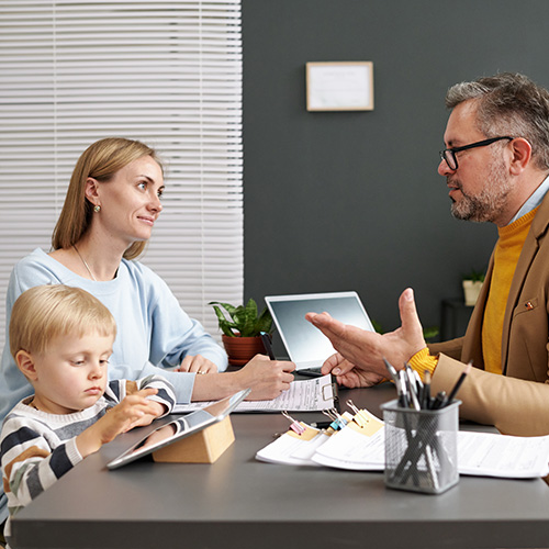 Social worker talking to woman about adoption