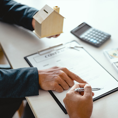 Business people signing contract making a deal with real estate agent Concept