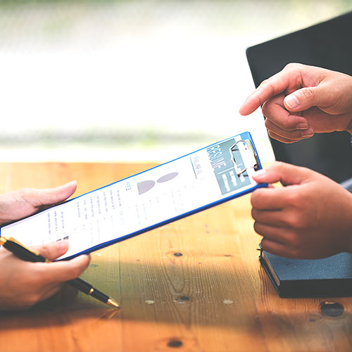 Woman submits her employer's resume to review job applications. Concept showcases her ability to get